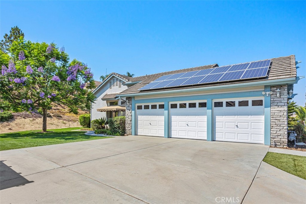 1795 Palomares Road Fallbrook, CA 92028 - Photo 36 of 37 a front view of a building with a garden and entryway