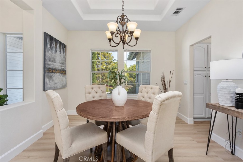 1795 Palomares Road Fallbrook, CA 92028 - Photo 10 of 37 a view of a dining room with furniture window and wooden floor