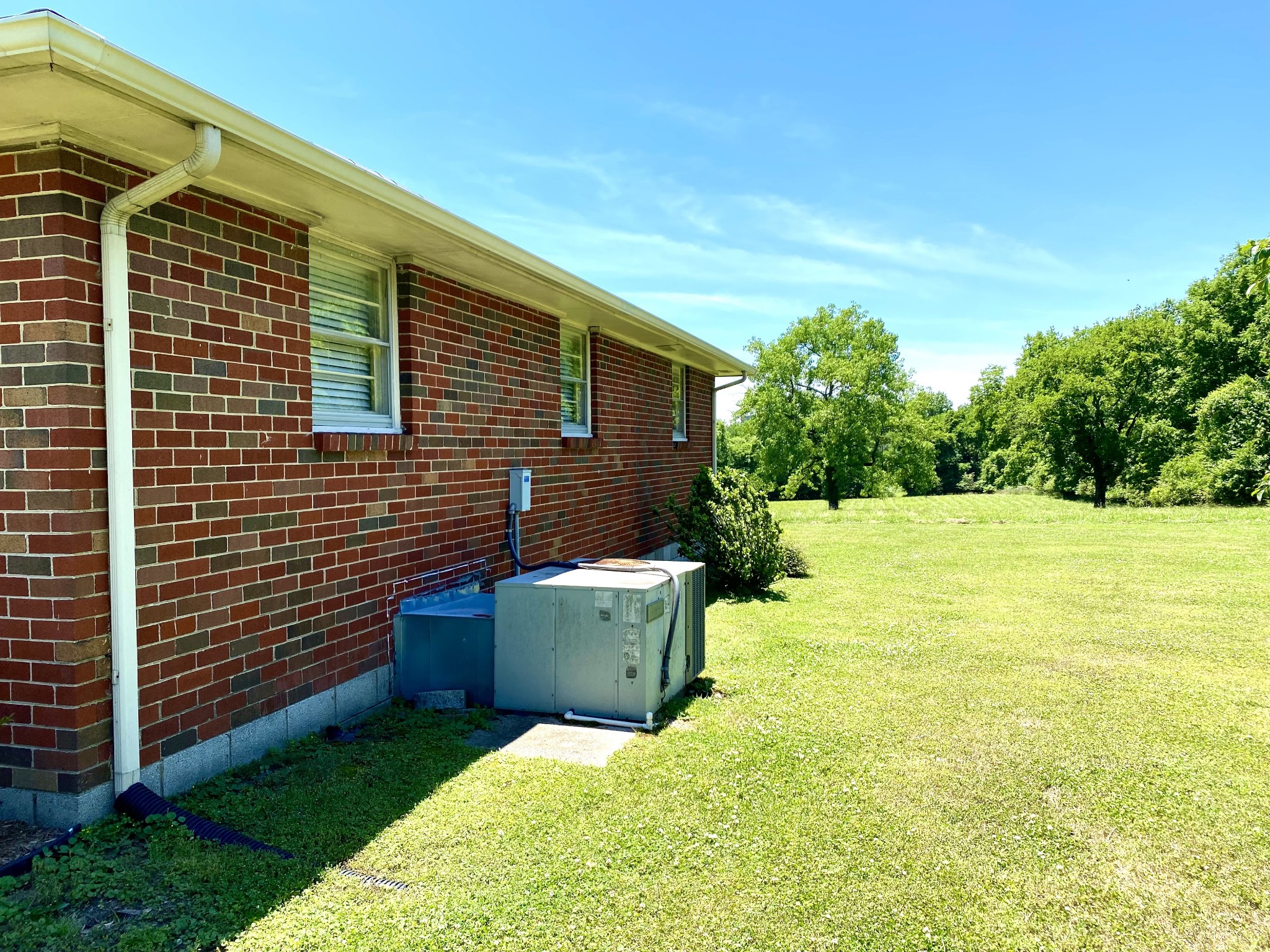 1102 Robinson Road Old Hickory, TN 37138 - Photo 3 of 36 a view of a backyard with plants and large tree