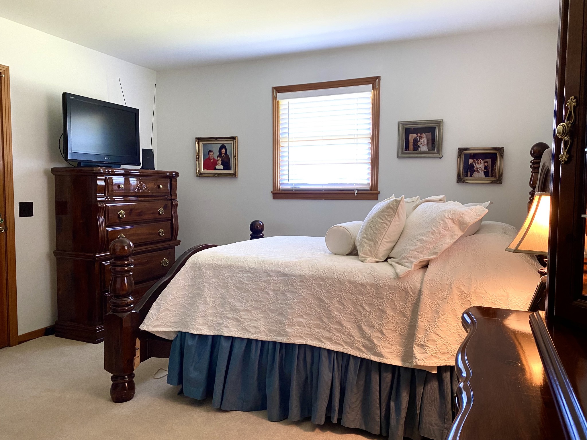1102 Robinson Road Old Hickory, TN 37138 - Photo 26 of 36 a bedroom with a bed and a flat tv screen on a dresser