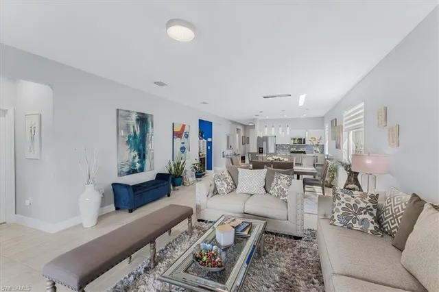 a living room with furniture and a couch