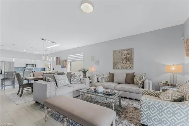 a living room with furniture and a couch