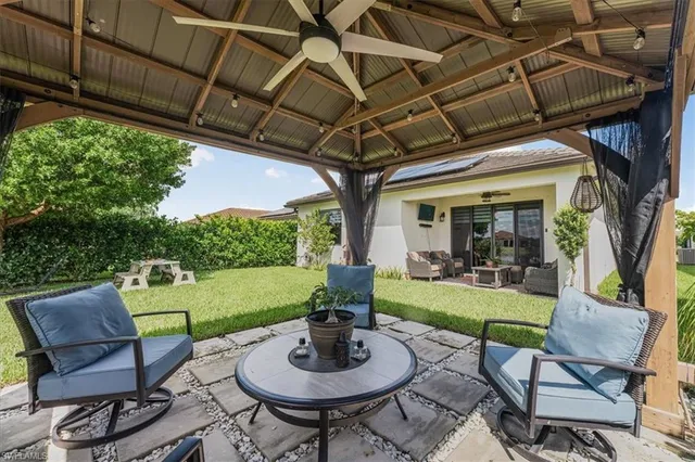 a view of a patio with chair and table