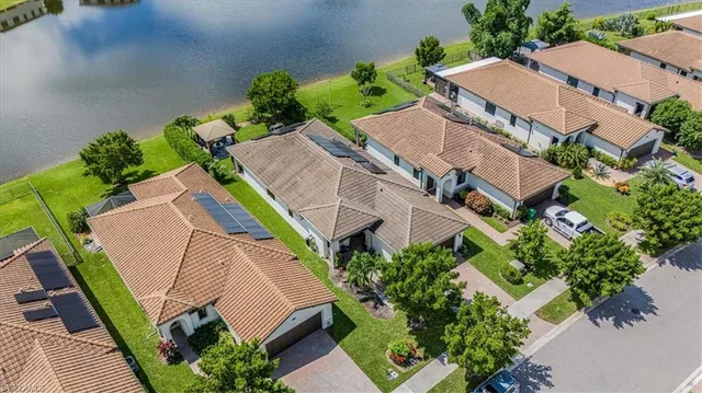 an aerial view of a house with outdoor space
