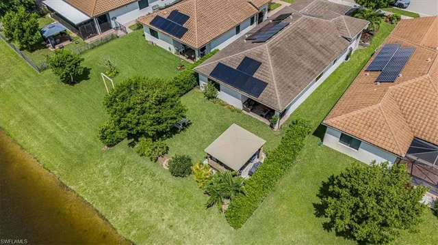 an aerial view of a house with a garden