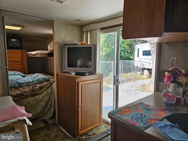 a backyard of a house with a yard and garage