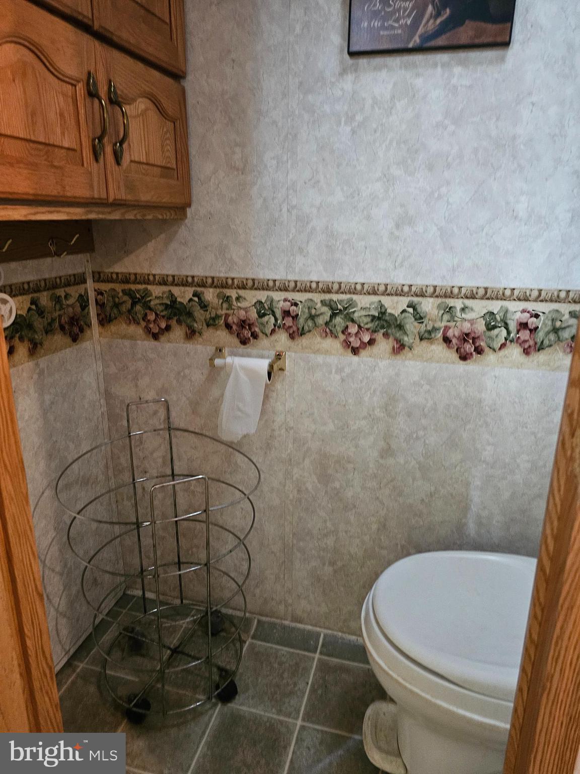 227-226 Little Beaver Lane, Unit GLEN 1 Earleville, MD 21919 - Photo 6 of 26 a white toilet sitting next to a shower