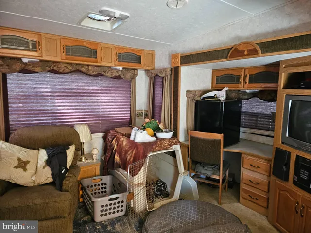 a view of entryway wih livingroom and furniture