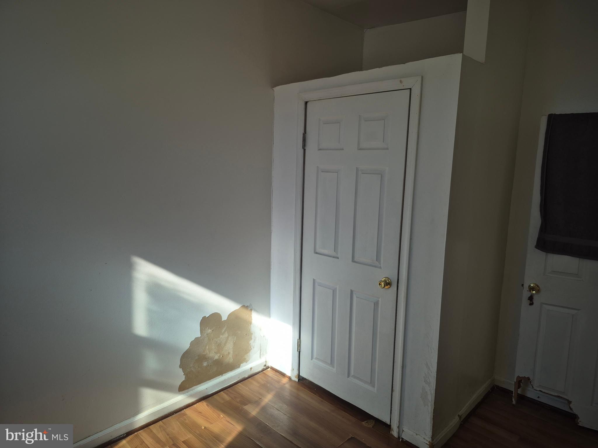 2924 Presstman Street Baltimore, MD 21216 - Photo 11 of 13 an entryway with wooden floor