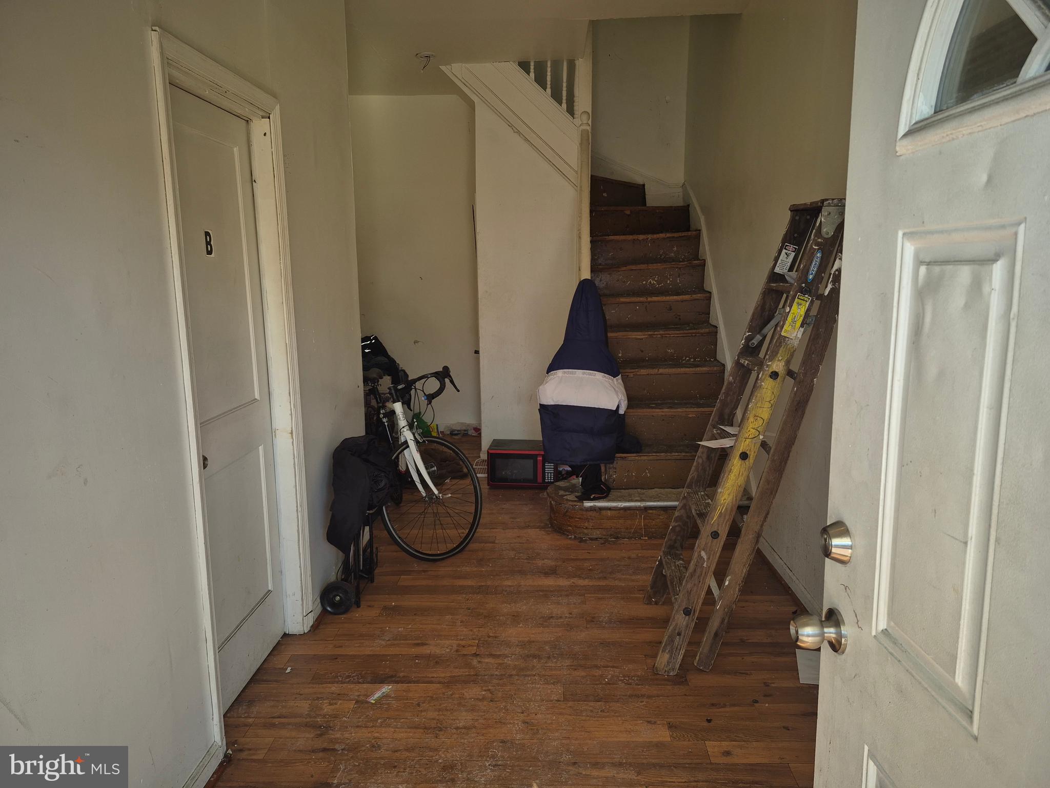 2924 Presstman Street Baltimore, MD 21216 - Photo 2 of 13 a view of entryway with wooden door