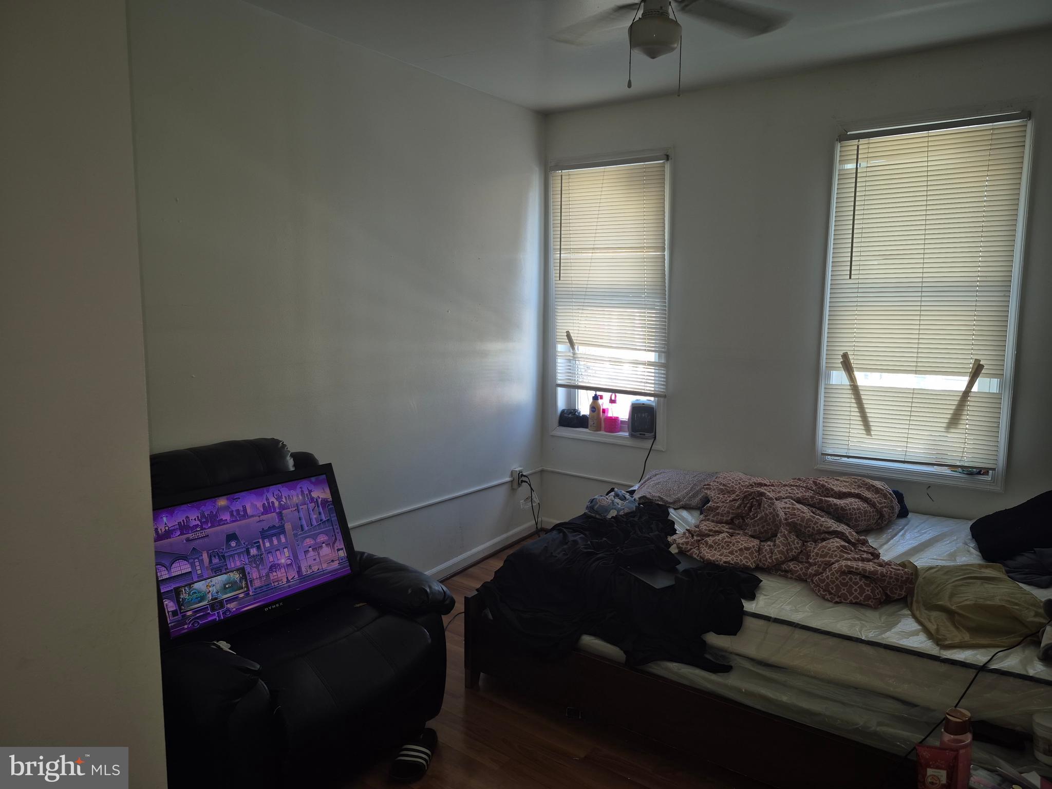 2924 Presstman Street Baltimore, MD 21216 - Photo 7 of 13 a living room with furniture and a window
