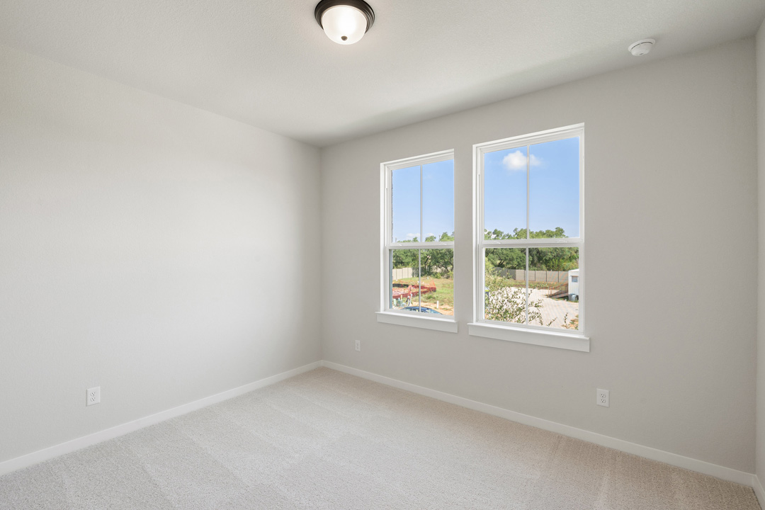 400 Bear Paw Run Georgetown, TX 78628 - Photo 30 of 38 an empty room with windows