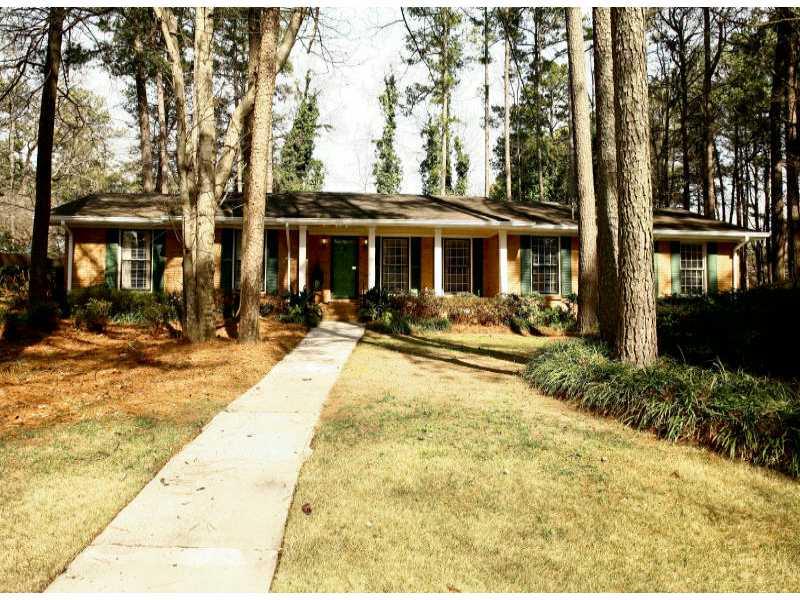 Exterior Front. Pristine brick traditional on corner lot...walk to award winning Briarlake Elementary School...quiet street....great curb appeal.