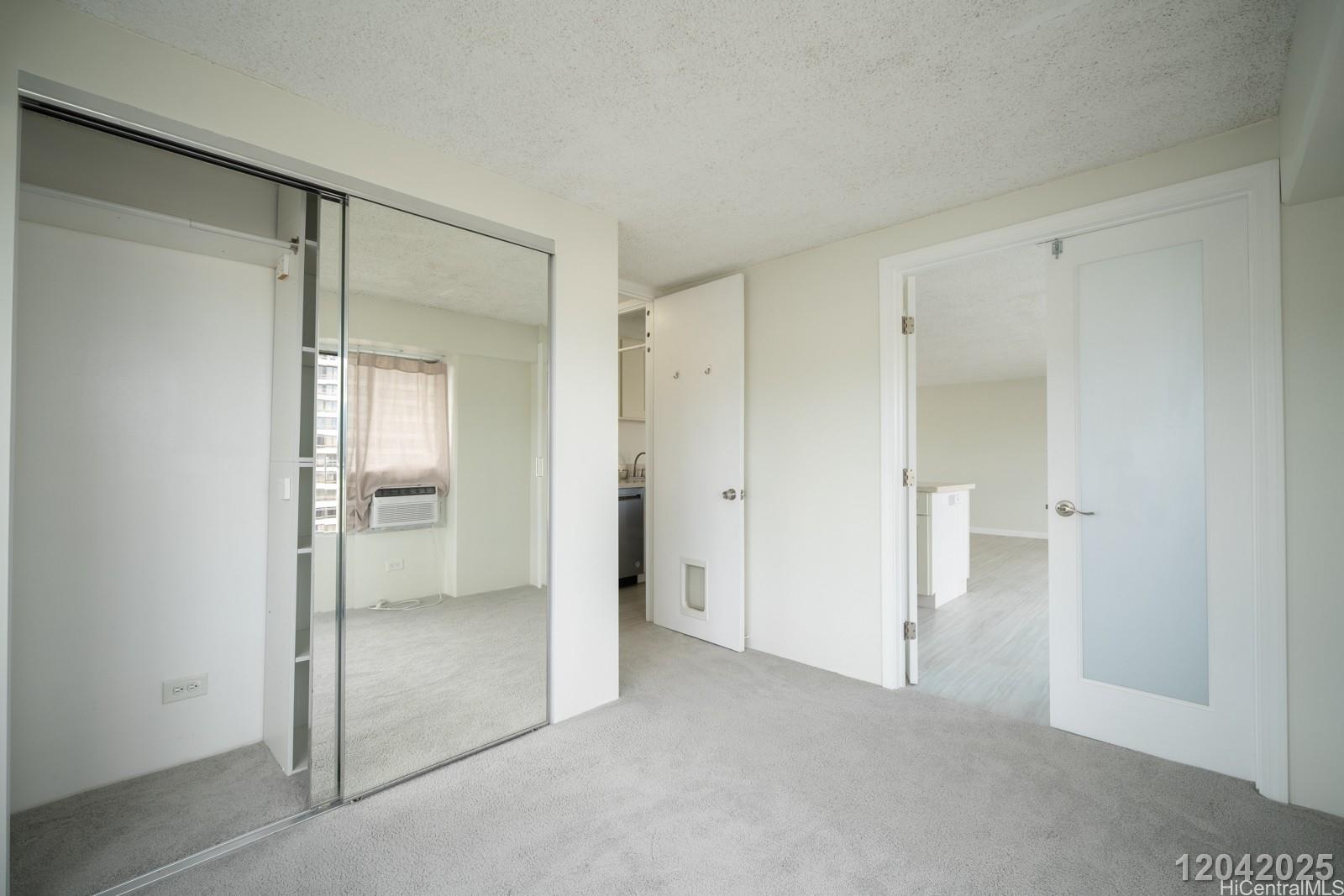 2525 Date Street, Unit 2405 Honolulu, HI 96826 - Photo 13 of 14 a view of an empty room