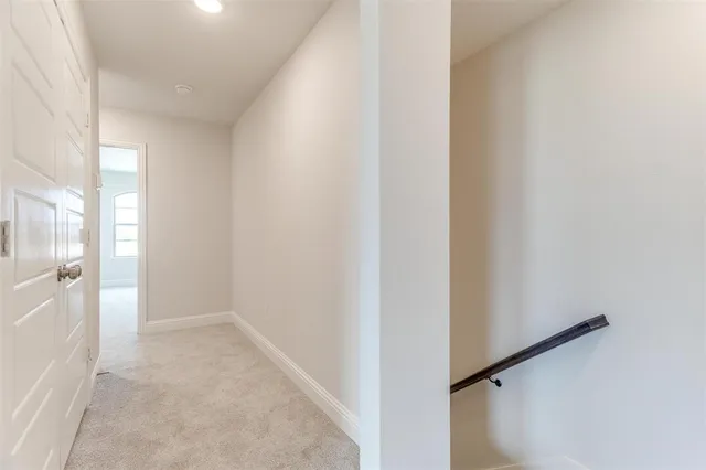 an empty room with a empty space and windows