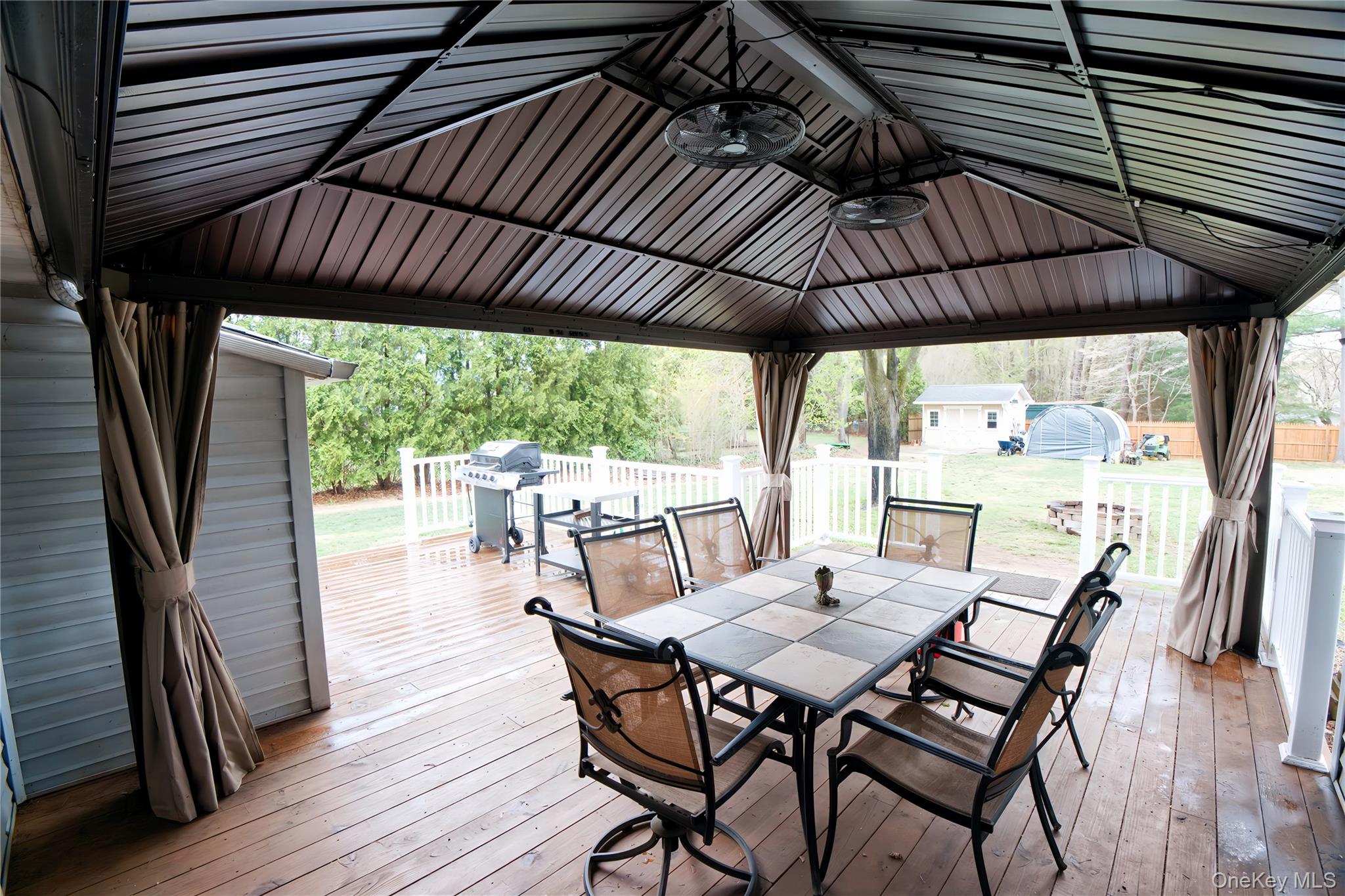 165 Randall Road Shoreham, NY 11786 - Photo 25 of 31 Covered Deck with lighting & Fans