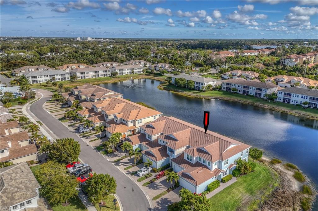 4607 Arboretum Circle, Unit 103 Naples, FL 34112 - Photo 24 of 29 an aerial view of residential houses with outdoor space