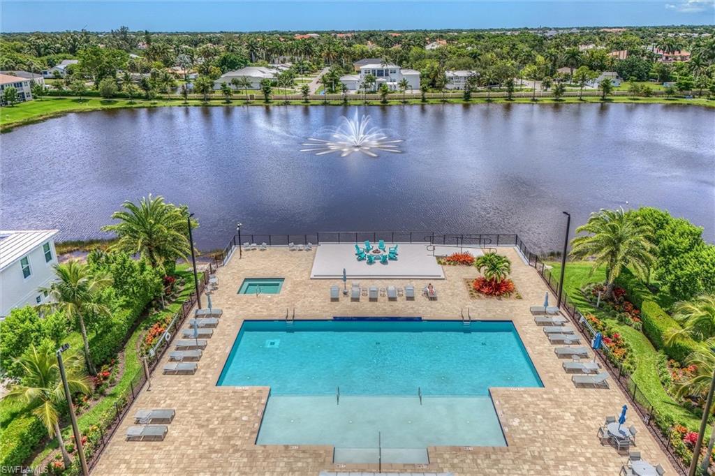 4607 Arboretum Circle, Unit 103 Naples, FL 34112 - Photo 26 of 29 a view of a lake with a floor