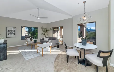 a view of a livingroom with furniture and window
