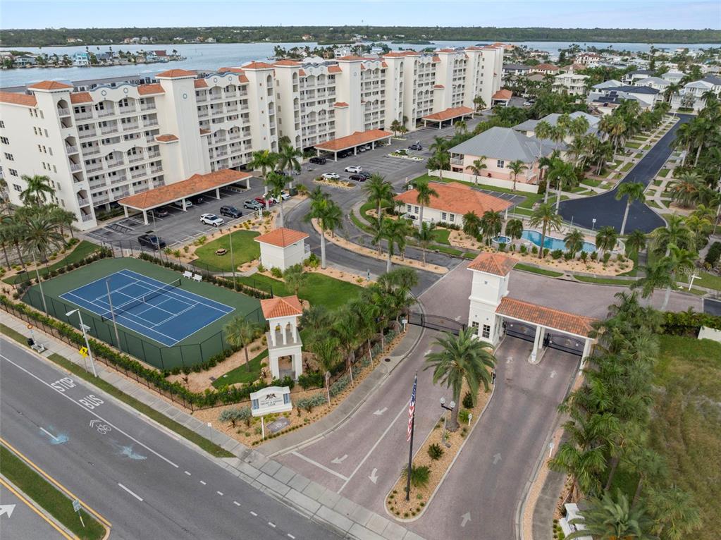 17715 Gulf Boulevard, Unit 302 Redington Shores, FL 33708 - Photo 1 of 1 an aerial view of residential houses with outdoor space