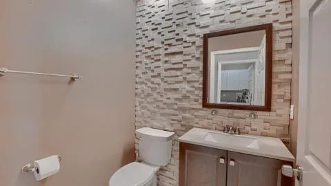 a view of storage and utility room with washer and dryer