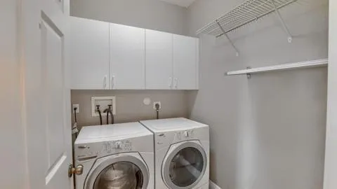a kitchen with sink cabinets and window