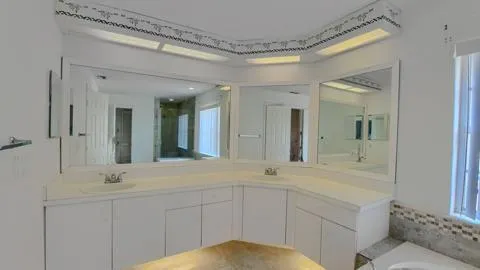 a bathroom with a tub and a shower