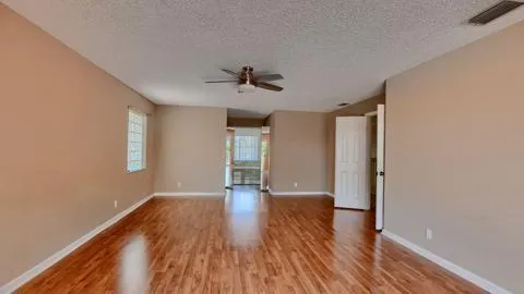 a kitchen with stainless steel appliances granite countertop a stove and a refrigerator