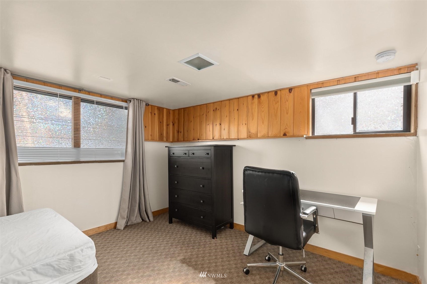 5416 20th Avenue Northeast Seattle, WA 98105 - Photo 11 of 21 a view of a workspace with furniture and a window