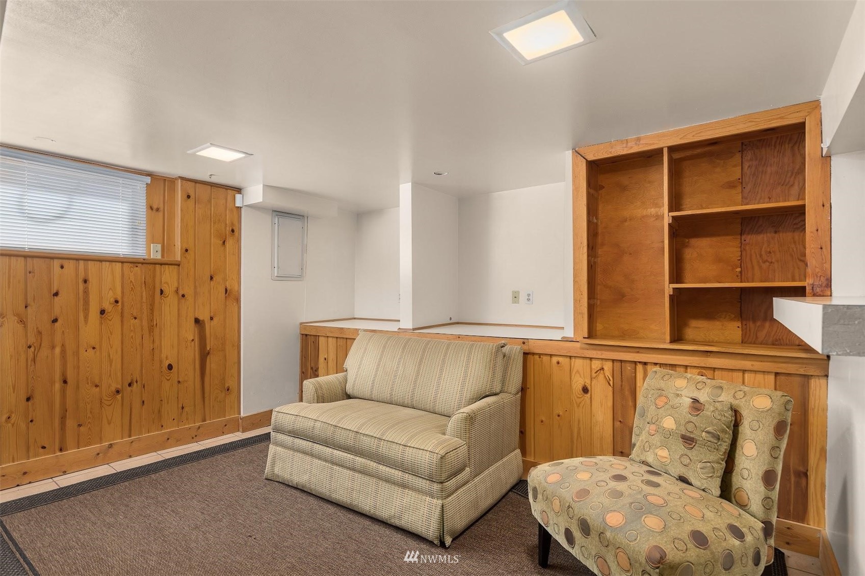 5416 20th Avenue Northeast Seattle, WA 98105 - Photo 13 of 21 a living room with furniture and a window