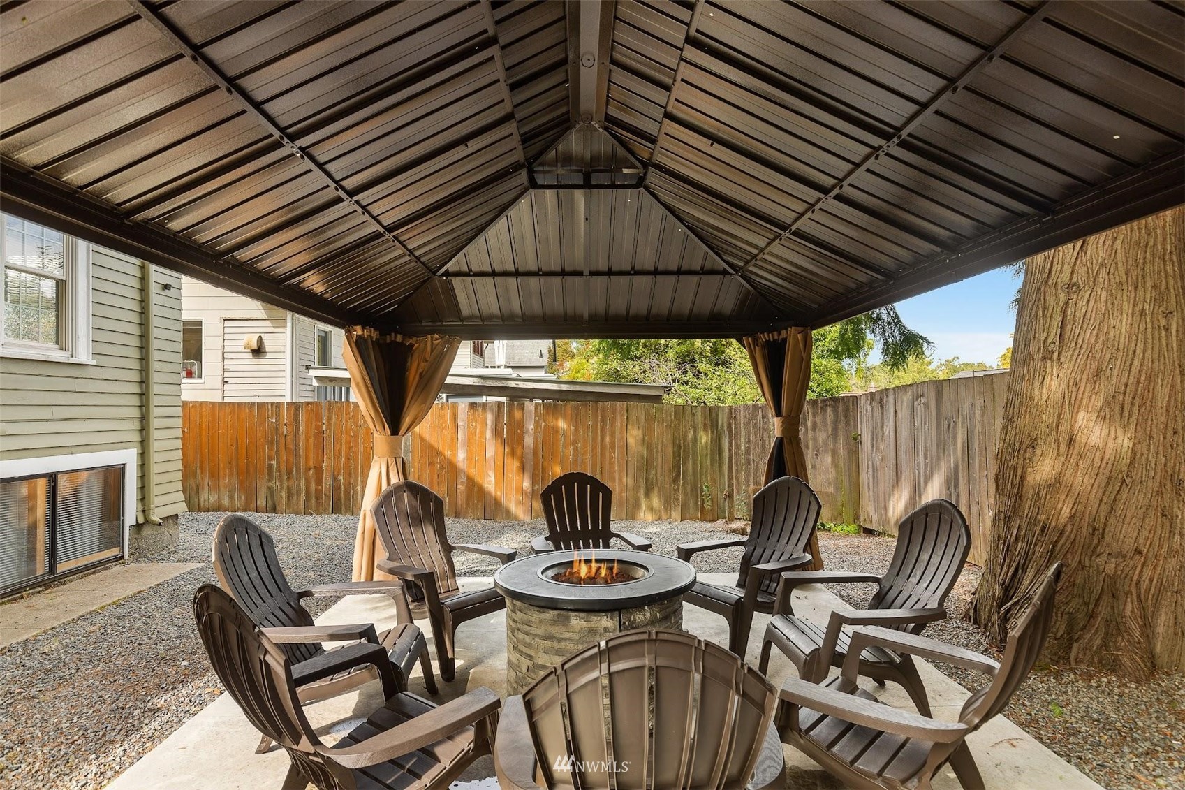 5416 20th Avenue Northeast Seattle, WA 98105 - Photo 20 of 21 a view of an outdoor sitting area in a backyard