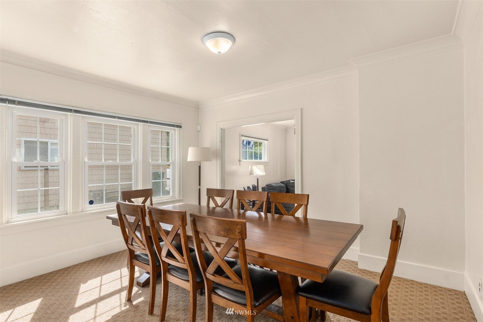 5416 20th Avenue Northeast Seattle, WA 98105 - Photo 6 of 21 a view of a dining room with furniture and wooden floor