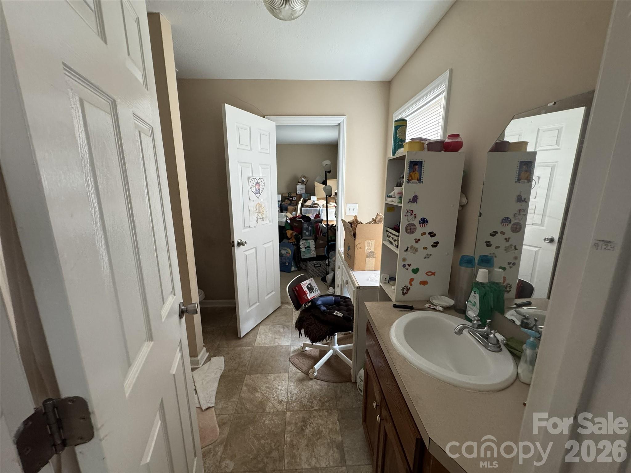 8441 Shelley Mullis Road Fort Mill, SC 29707 - Photo 16 of 23 a bathroom with double vanity sink and a mirror