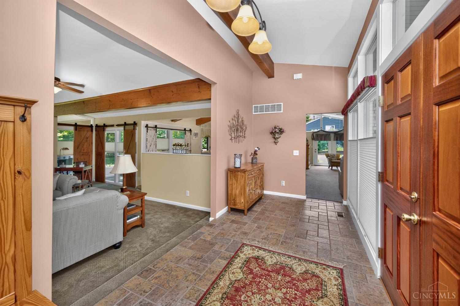 3078 Ebenezer Road Cincinnati, OH 45233 - Photo 5 of 51 Natural light floods the gracious entryway, which features floor to ceiling windows.