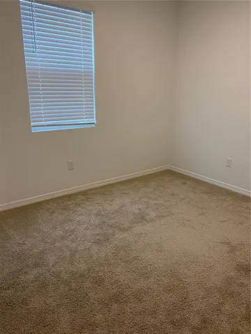 a bathroom with a granite countertop toilet a sink and bathtub