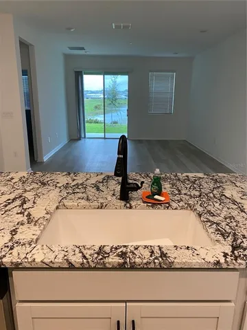 a view of a living room with furniture