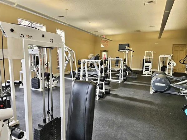 a view of a room with gym equipment