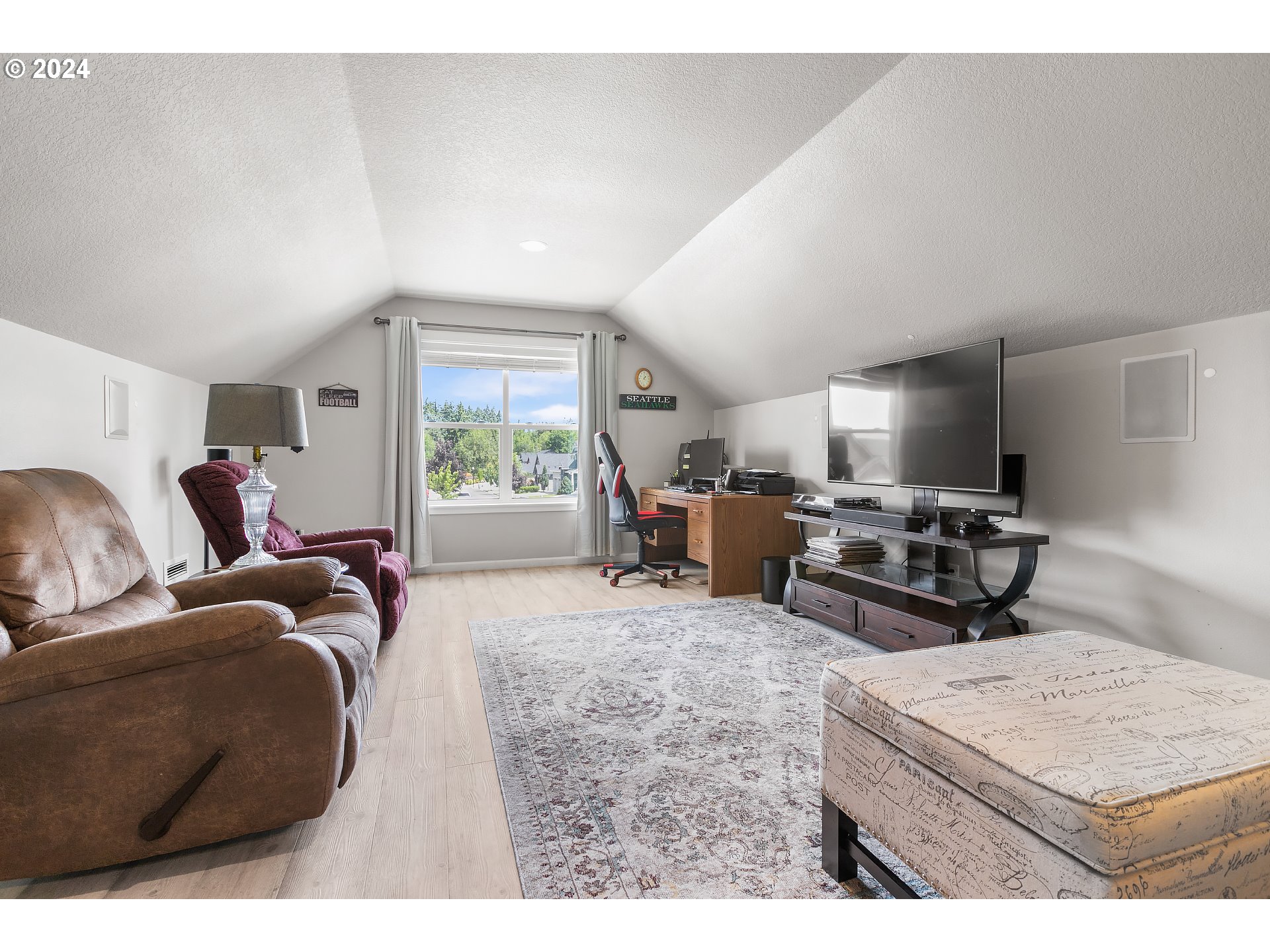 4837 North 6th Street Ridgefield, WA 98642 - Photo 24 of 43 a living room with furniture and a window