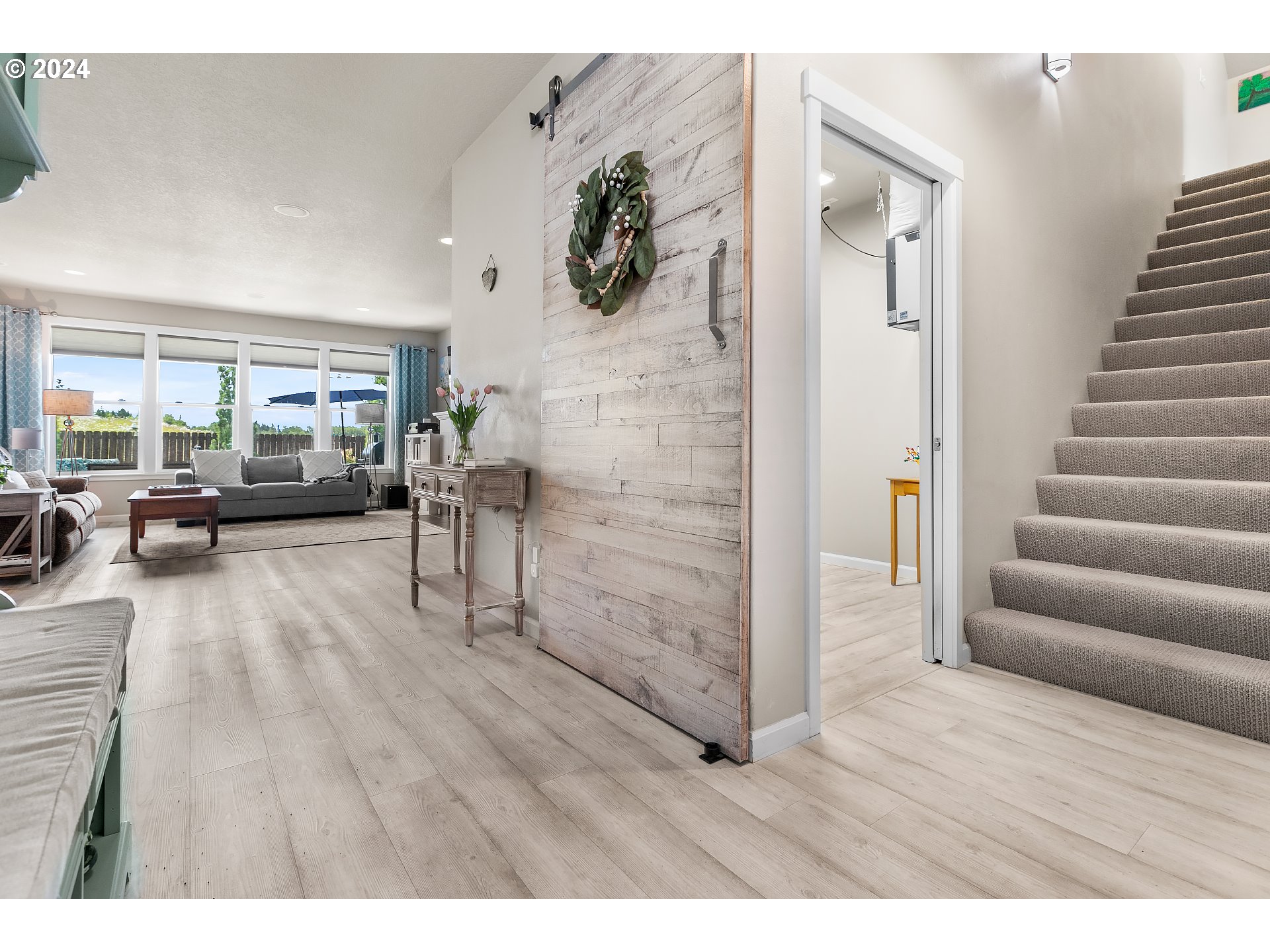4837 North 6th Street Ridgefield, WA 98642 - Photo 4 of 43 a view of an entryway with wooden floor
