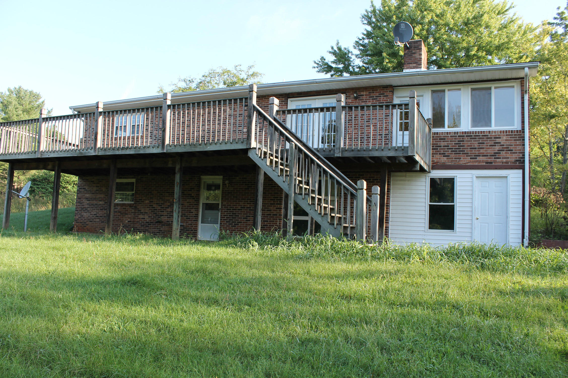 1798 Algoma Road Callaway, VA 24067 - Photo 22 of 23 a house with a tree in front of it