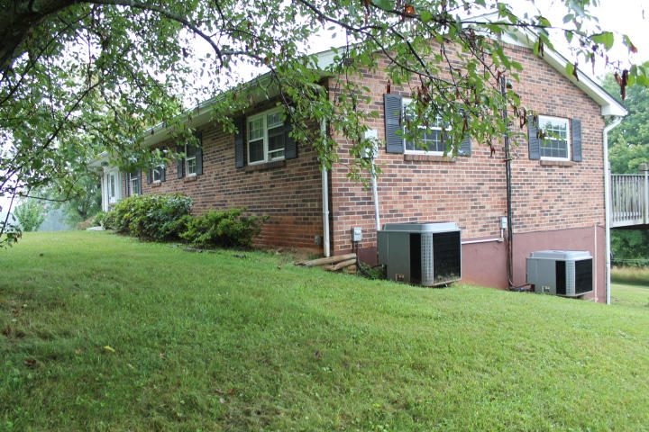 1798 Algoma Road Callaway, VA 24067 - Photo 6 of 23 a view of a house with backyard and a tree