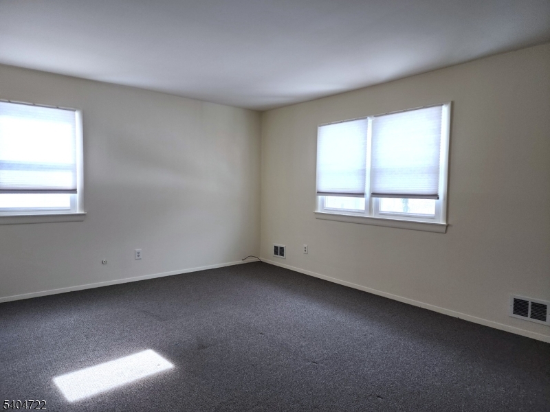 19 Grove Street, Unit B Wanaque, NJ 07465 - Photo 16 of 24 an empty room with a window