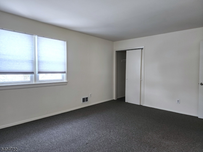 19 Grove Street, Unit B Wanaque, NJ 07465 - Photo 17 of 24 an empty room with a window