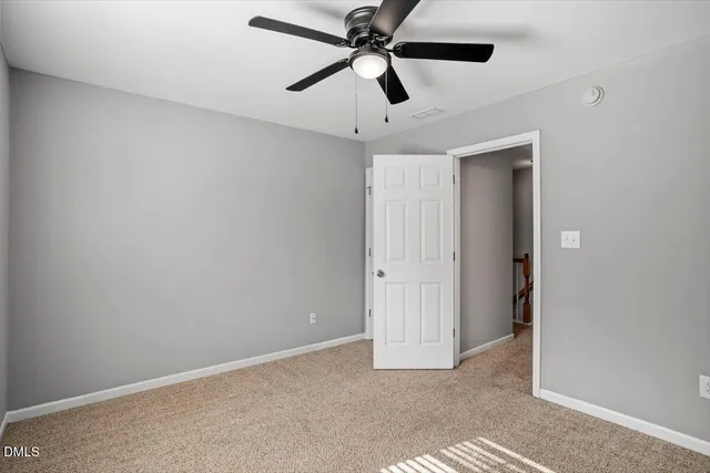 a bathroom with a double vanity sink toilet and shower