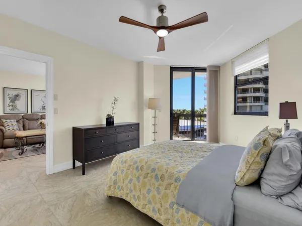 a bed room with a bed and a window