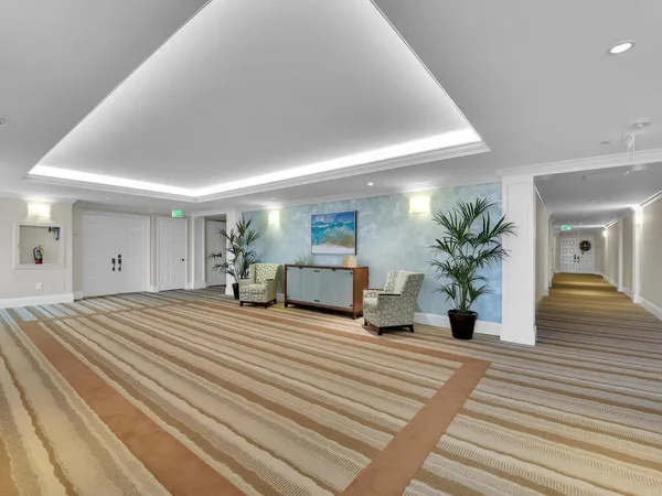 a view of a living room and dining room