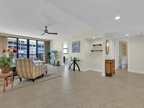 a living room with furniture and a table
