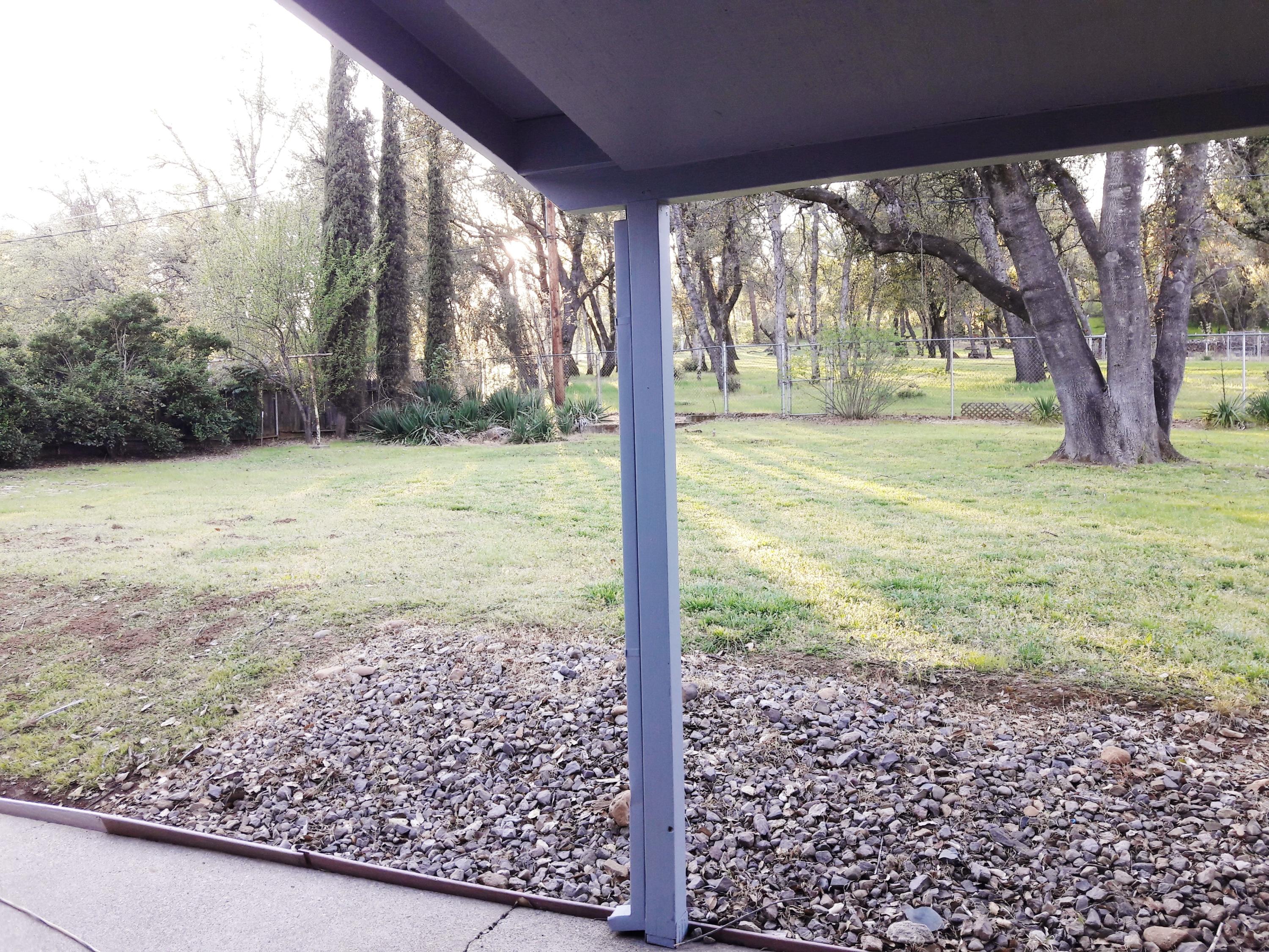 1610 Canyon Road Redding, CA 96001 - Photo 38 of 41 a view of a yard with large trees