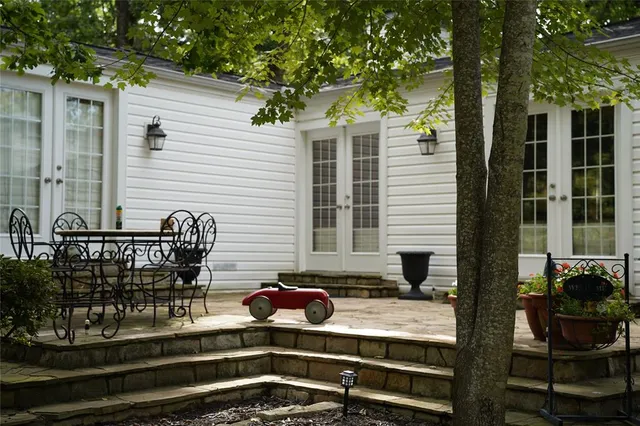 a backyard of a house with seating space