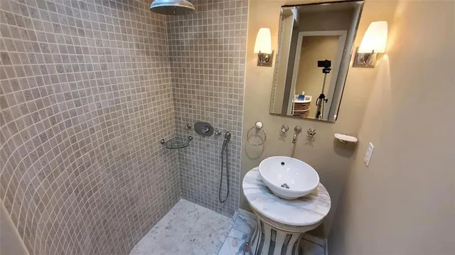 a bathroom with a toilet and a sink